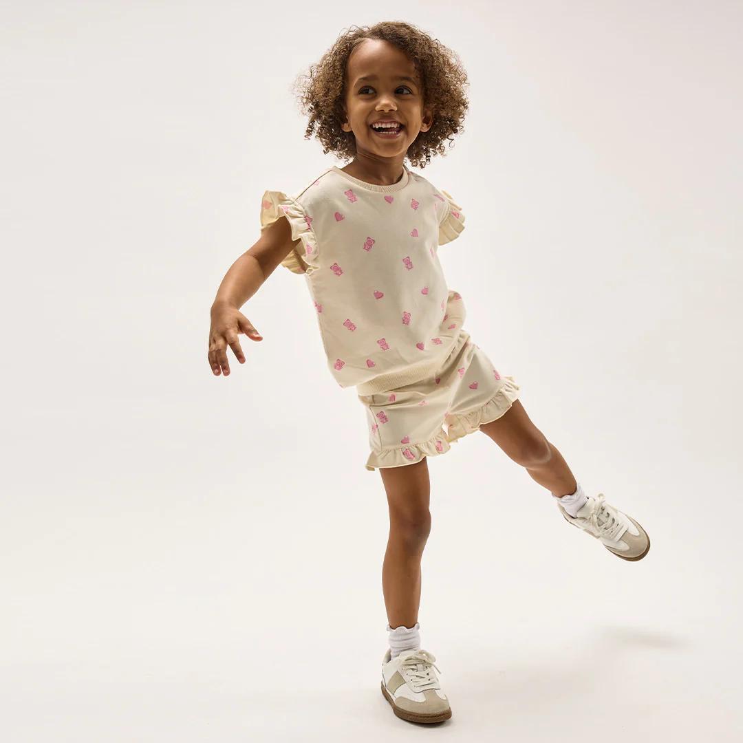 Gummy Bears on Ivory Ruffled Top